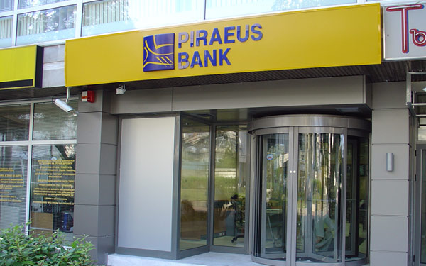 Piraeus Bank profită de criza din Cipru și devine cea mai mare bancă din Grecia